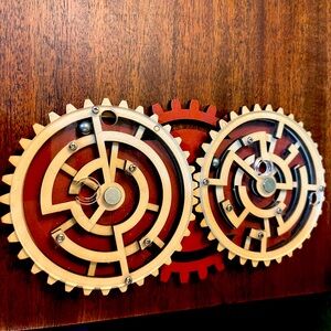 Beautiful “Double Trouble” handheld puzzle ball game